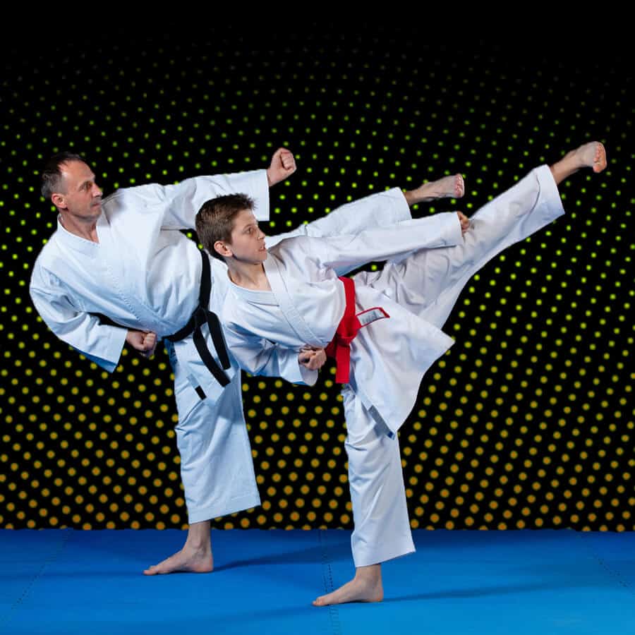 Martial Arts Lessons for Families in Spring Hill KS - Dad and Son High Kick
